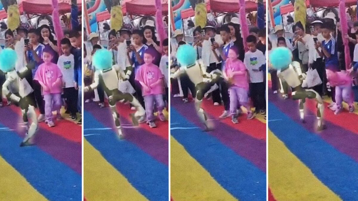 Robot Kicks Small Child In Stomach During Event