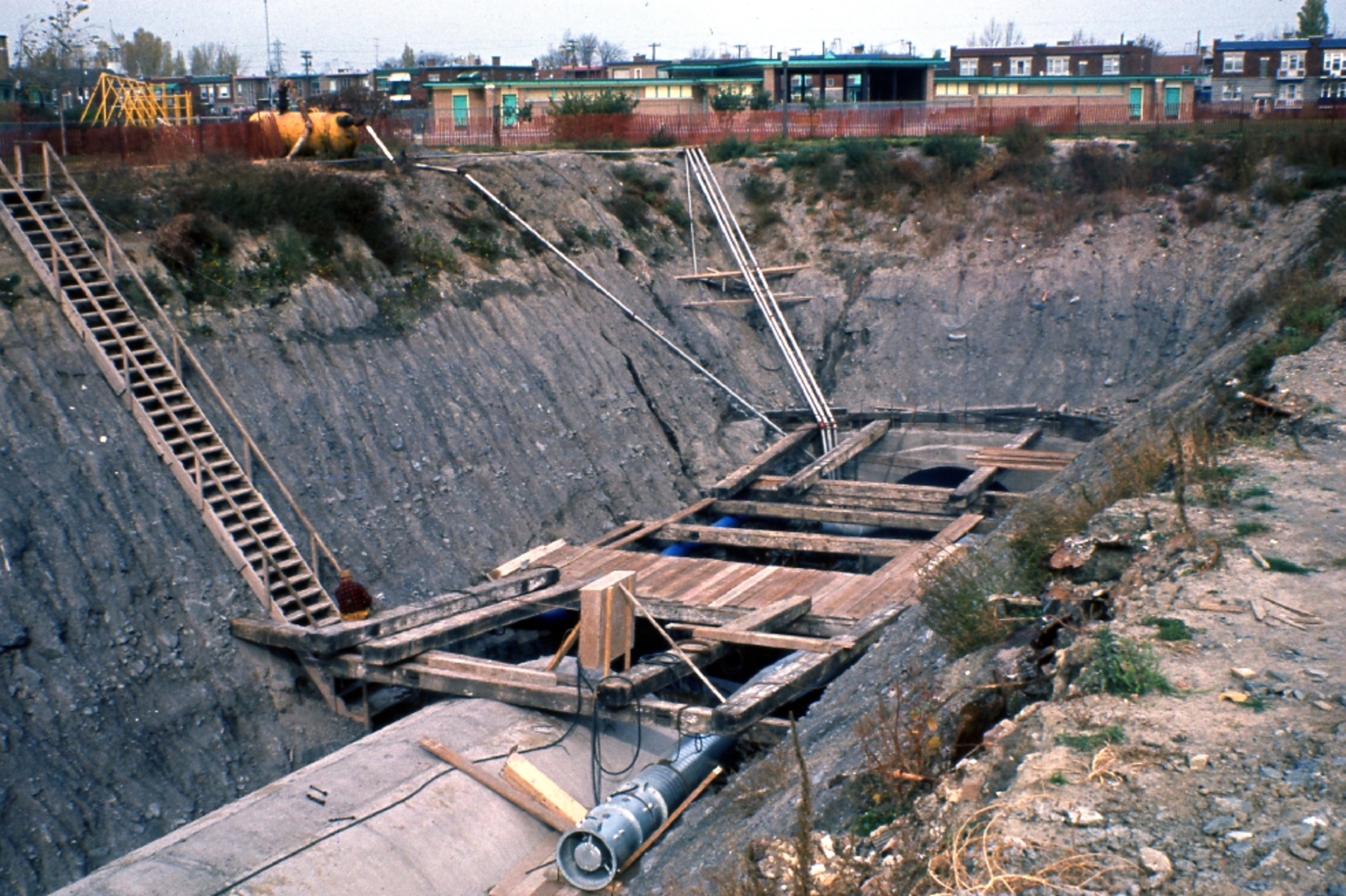 A tunnel is built in a large trench.