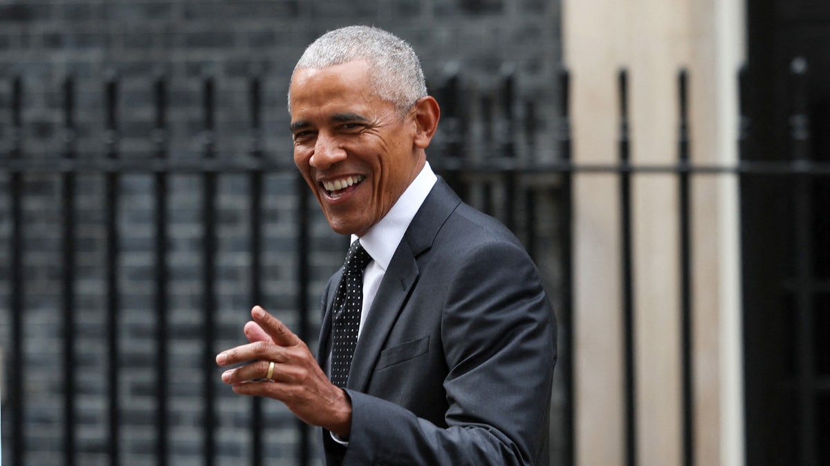 Former President Barack Obama walking outside 10 Downing Street in London.