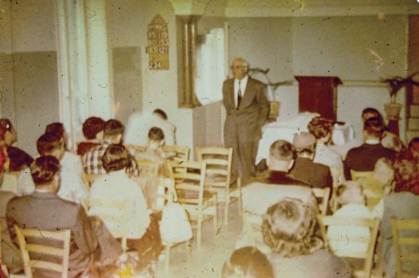 Albert Bryan speaks during a service in Tripoli.
