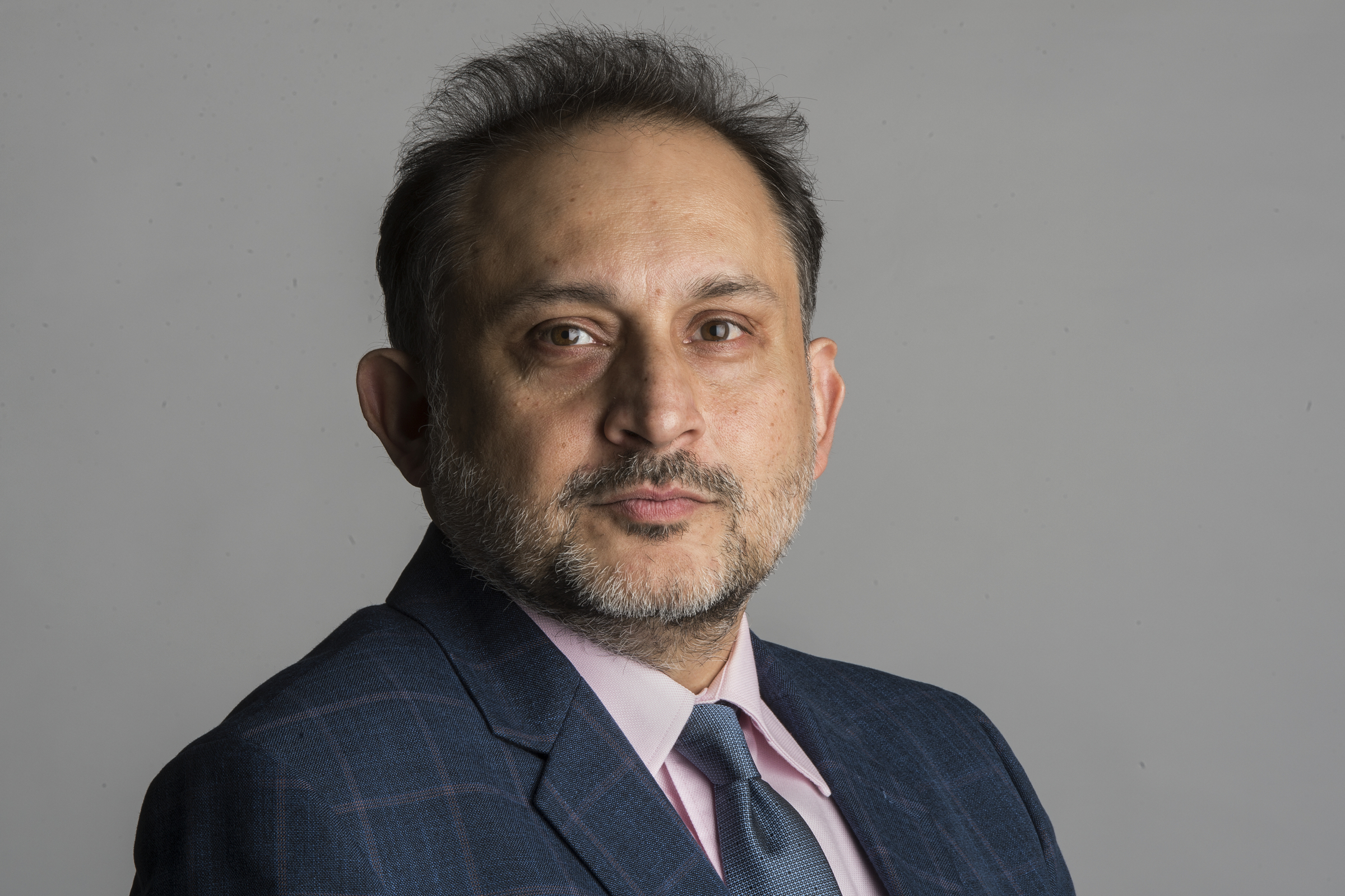 A professional headshot of Murtaza Haider.