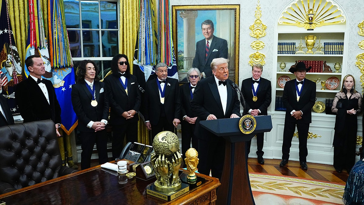 President Donald Trump delivering remarks in the Oval Office with Kennedy Center Honorees including Paul Stanley and Gene Simmons
