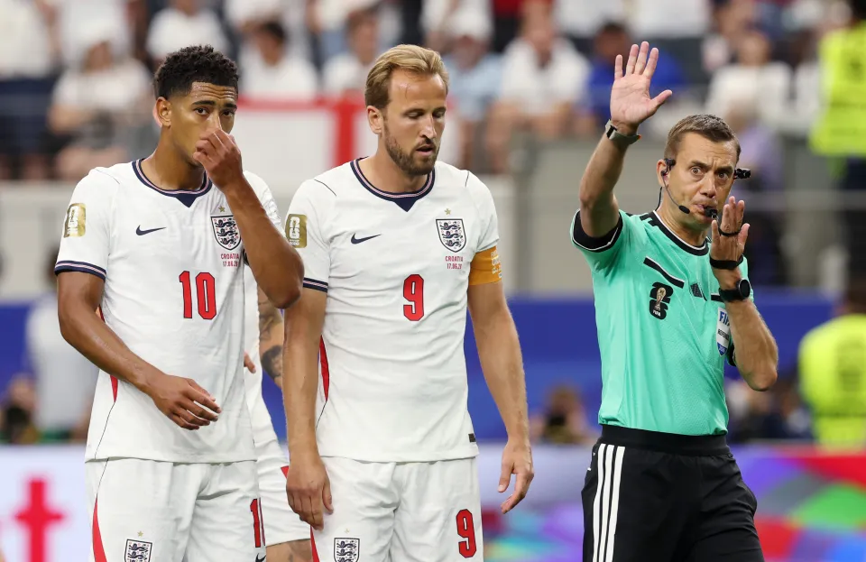 Harry Kane reacts after missing a penalty