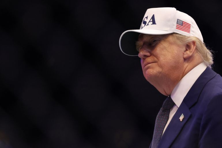 President Donald Trump stands in the octagon during UFC Freedom 250