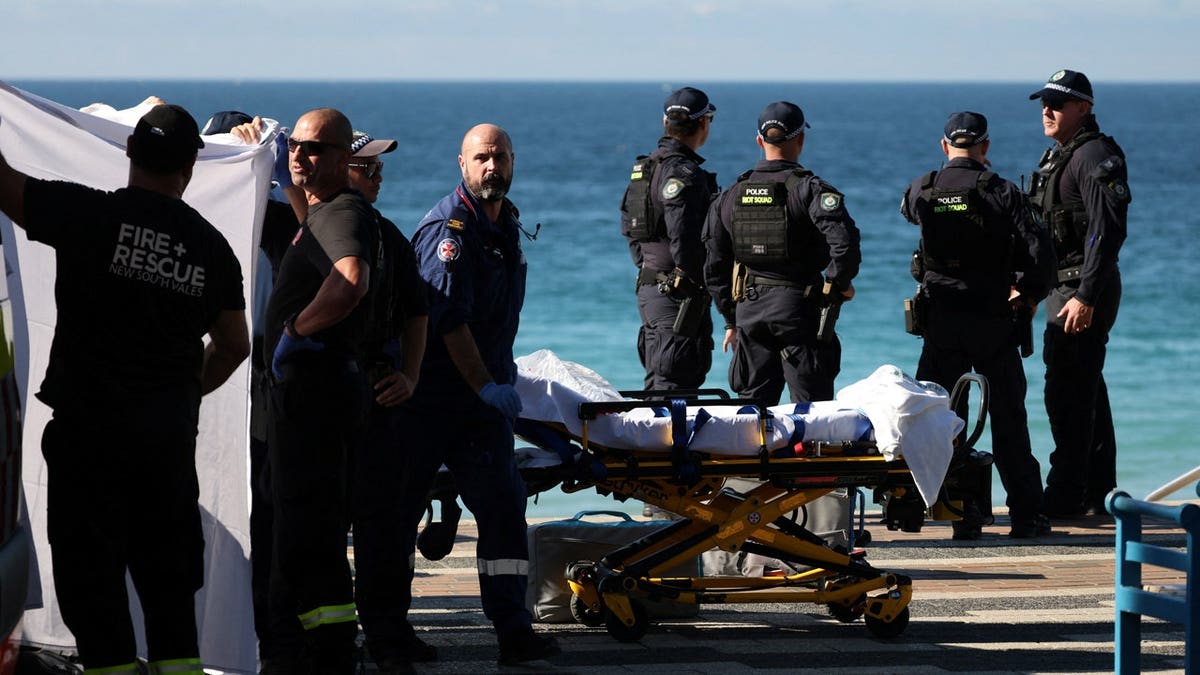 Police and emergency personnel at the scene after reports of a shark attack at Coogee Beach in Sydney, Australia, June 13, 2026.