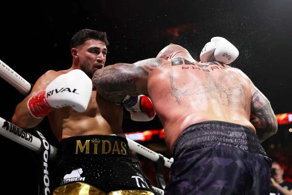 Fury announced his baby's new name on his shorts as Midas, while cruising to a points win over Hall