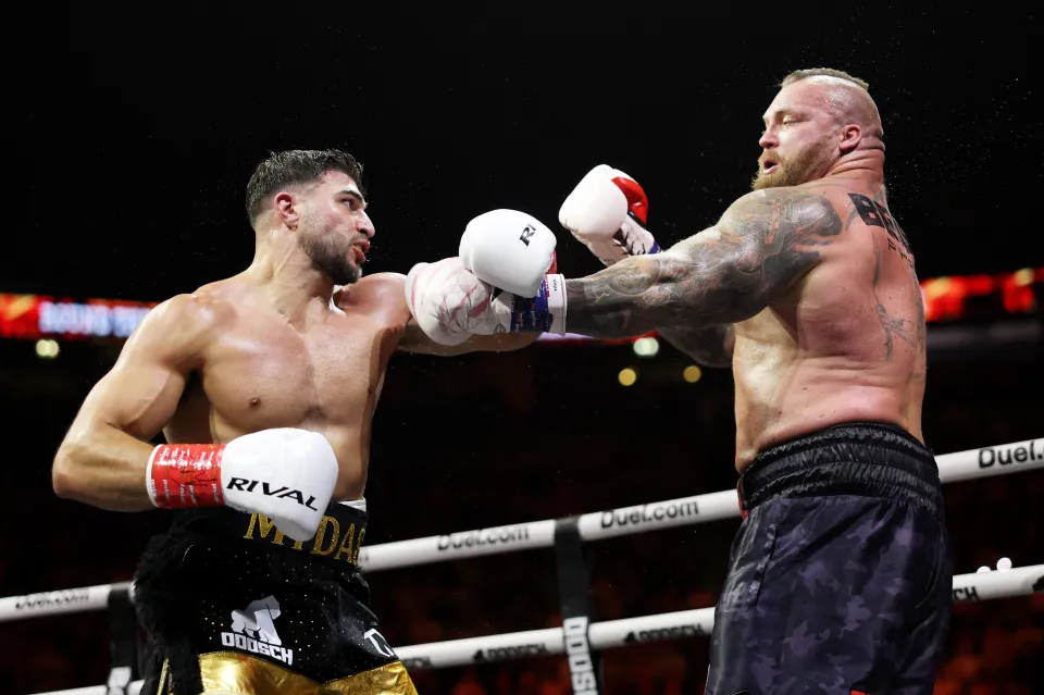 Tommy Fury punches Eddie Hall during the Beauty versus The Beast fight night at AO Arena on June 13, 2026 in Manchester, England
