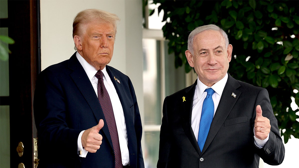 President Donald Trump and Israeli Prime Minister Benjamin Netanyahu giving thumbs up at the White House