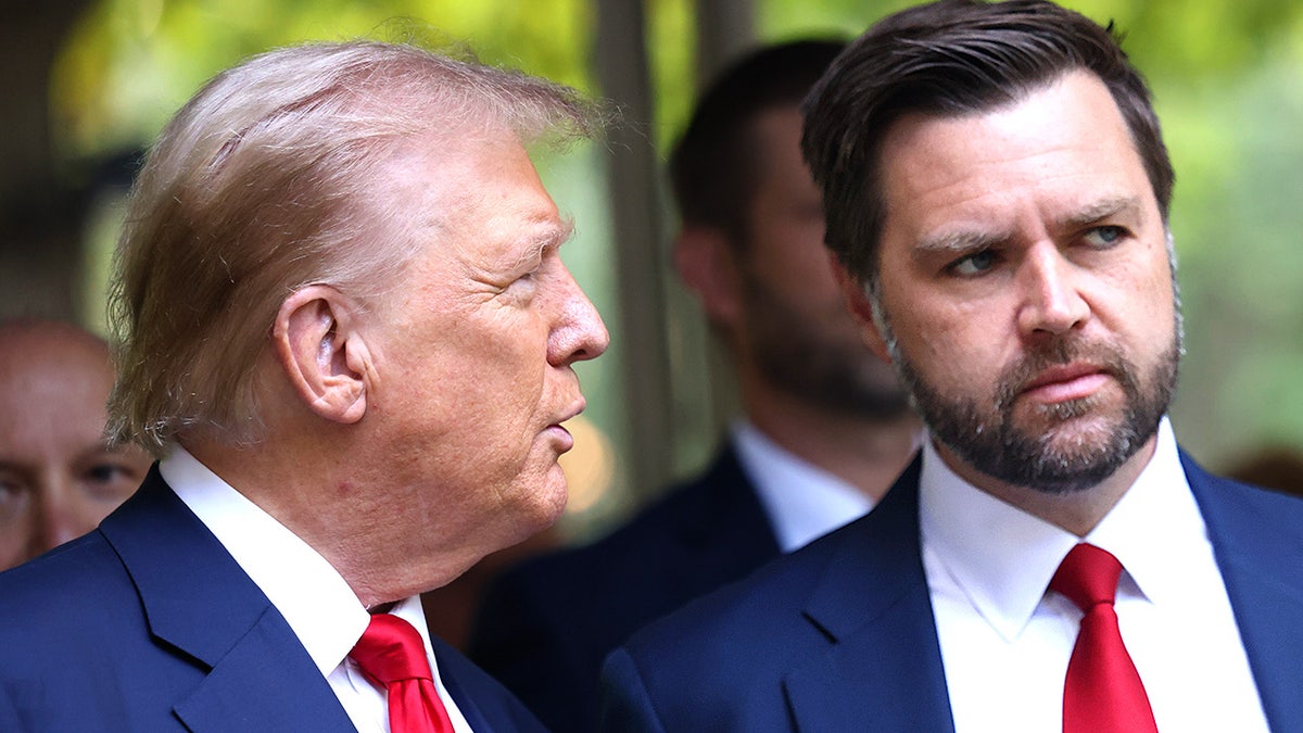 Republican presidential nominee Donald Trump and Sen. JD Vance standing at Ground Zero in New York City.