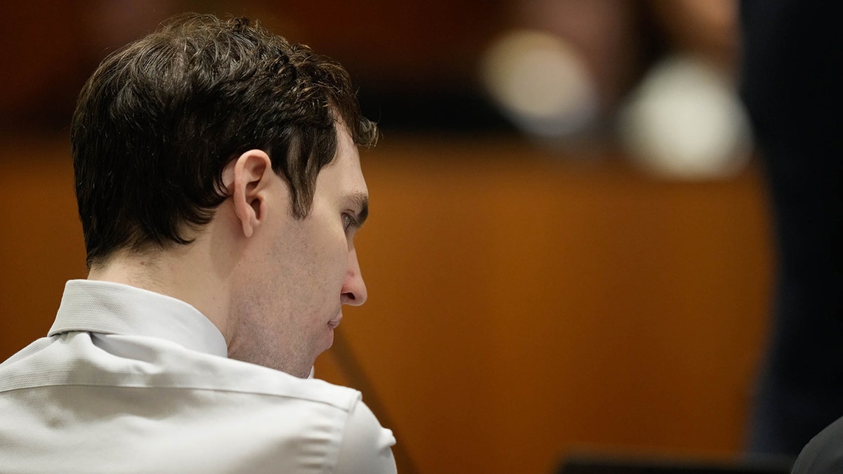 Tyler Robinson seated in a courtroom during a hearing in Provo, Utah