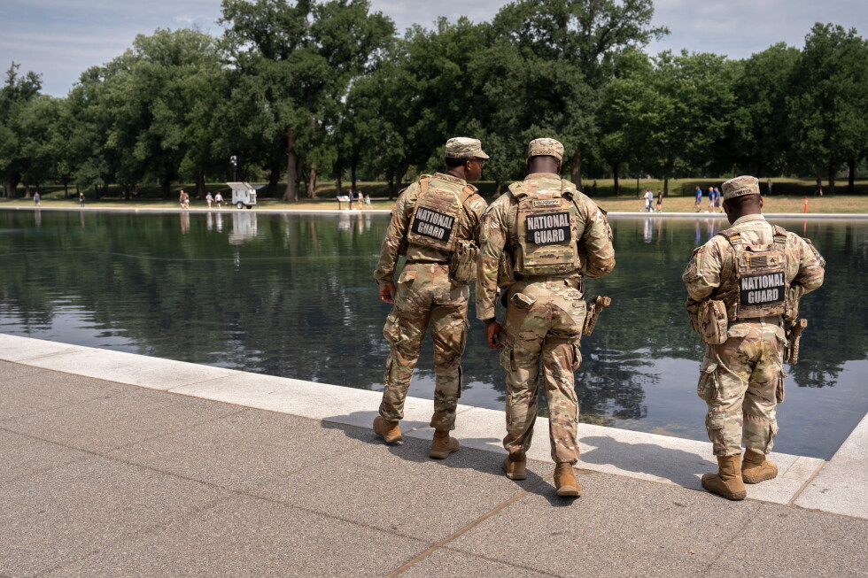 National Guard and US Park Police patrol Reflecting Pool as coating peels
