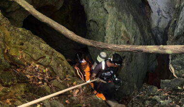 Laos rescue workers seek alternative route to 2 trapped in cave