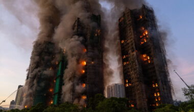 Hong Kong charges 7 people over apartment fire that killed 168