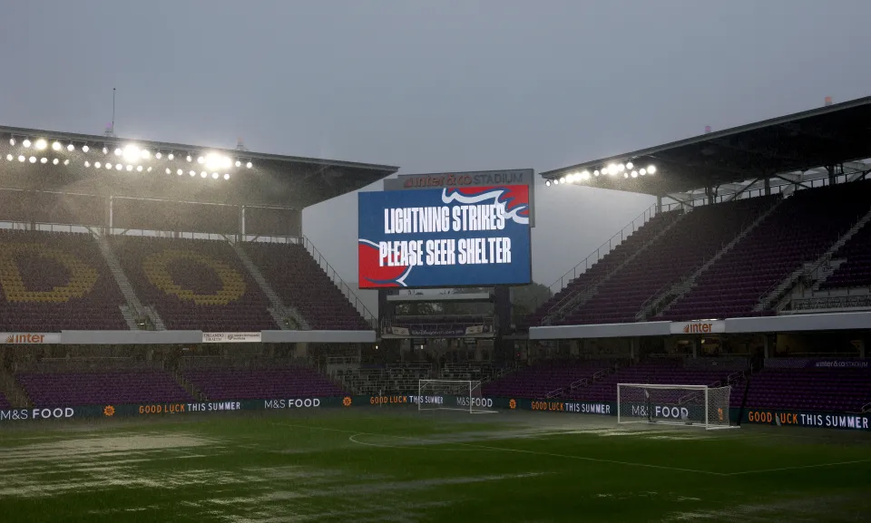 A sign warning fans to take shelter from the bad weather in Florida ahead of England's World Cup warm-up game 