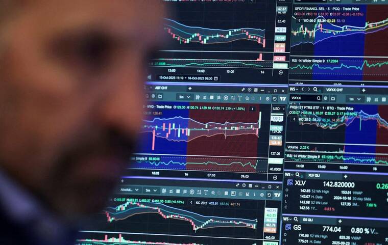 REUTERS/JEENAH MOON/FILE PHOTO
A trader works on the floor at the New York Stock Exchange in New York City, in October 2025. The S&P 500 and Nasdaq finished June today with their biggest quarterly gains since 2020 as investors remained upbeat about economic and earnings growth even amid the Middle East conflict.
