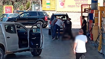 One of several sites of a shooting in central Israel, on Sunday. Credit: Used under section 27A of the Israeli Copyright Law One of several sites of a shooting in central Israel, on Sunday.