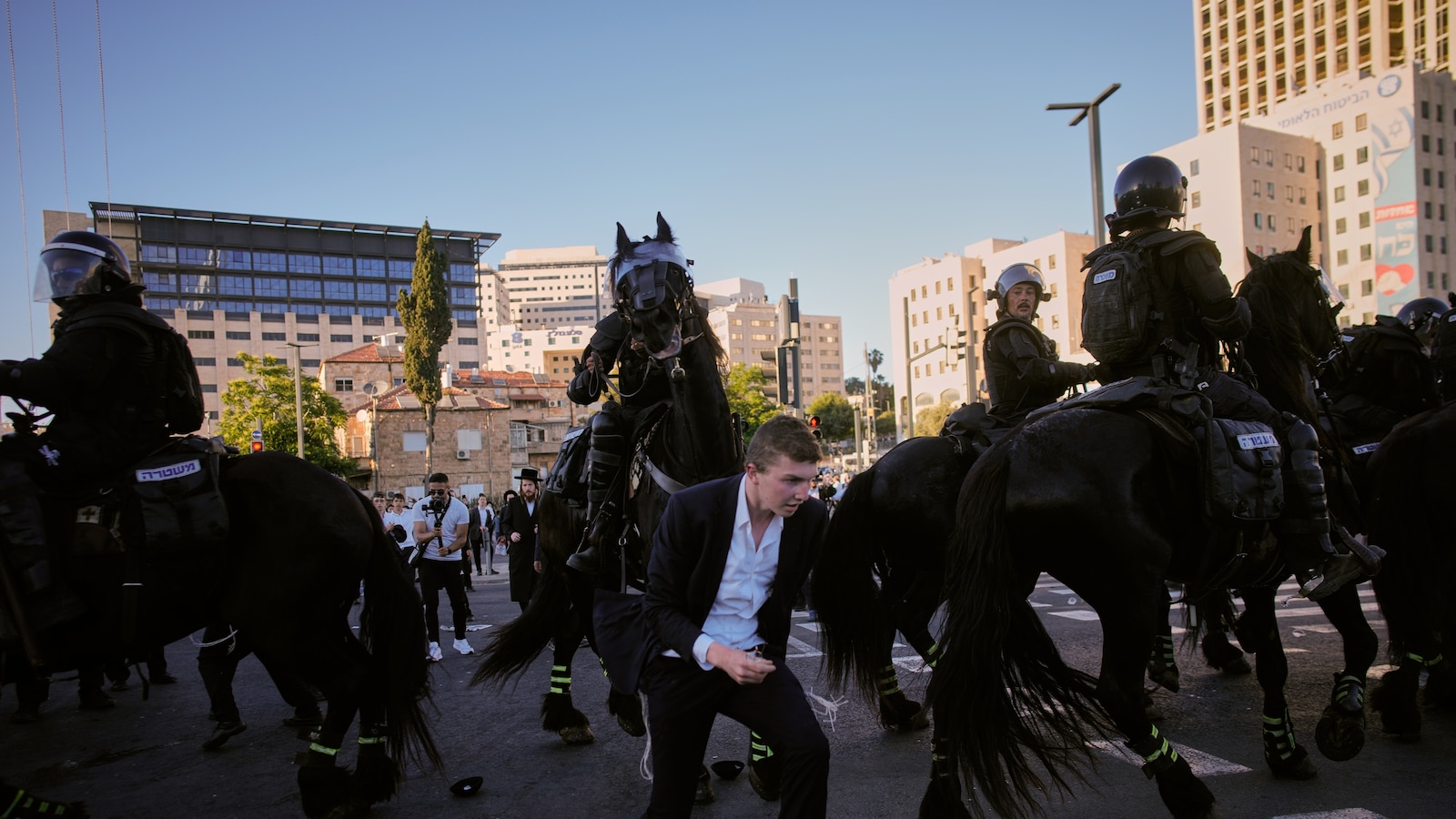 Ultra-Orthodox protesters block roads and trains across Israel over military draft