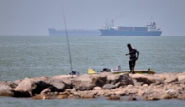 Iranian drones attack Bahrain and a ship is struck in the strait after US airstrikes