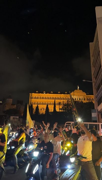 Demonstrators identified with the Hezbollah camp protesting outside the Grand Serail in Beirut (al-Manar, June 27, 2026)