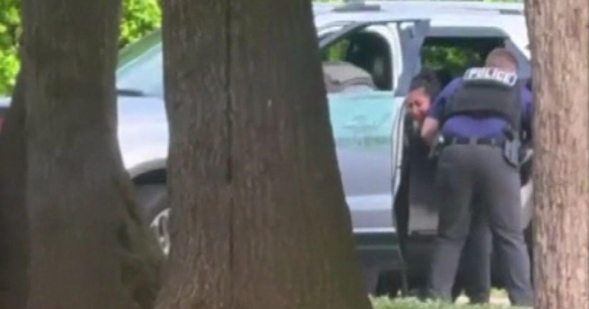 DHS says detained man "violently resisted arrest" outside Baltimore school