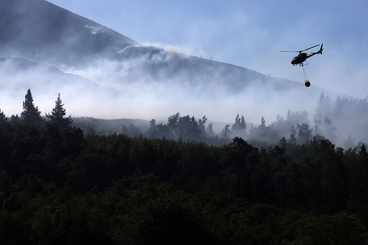 Moorland fires above Dovestone Reservoir, Saddleworth in Oldham on Sunday, which along with fires in North Wales, left smoke hanging over Liverpool