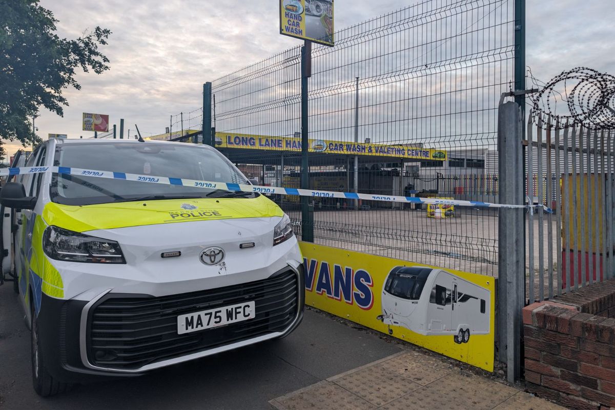 Merseyside Police cordon off Long Lane Hand Car Wash on Sunday, July 5, after a man suffered a puncture wound to his back in a fight between a group of males