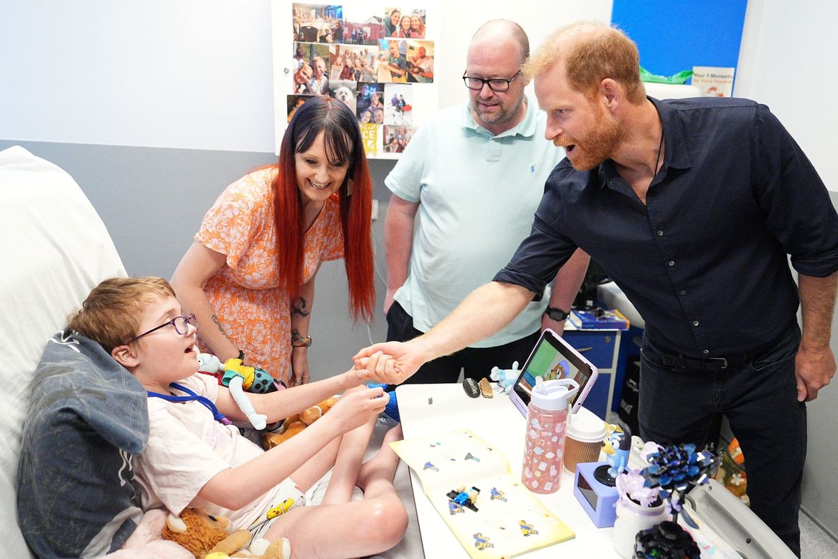 Harry with 12-year-old Alec Hill