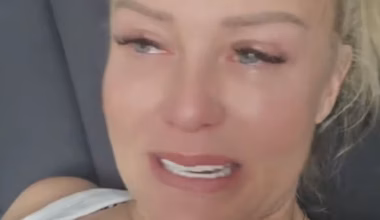 Tearful mum escorted back through UK airport after she's barred from going on £6.5k holiday