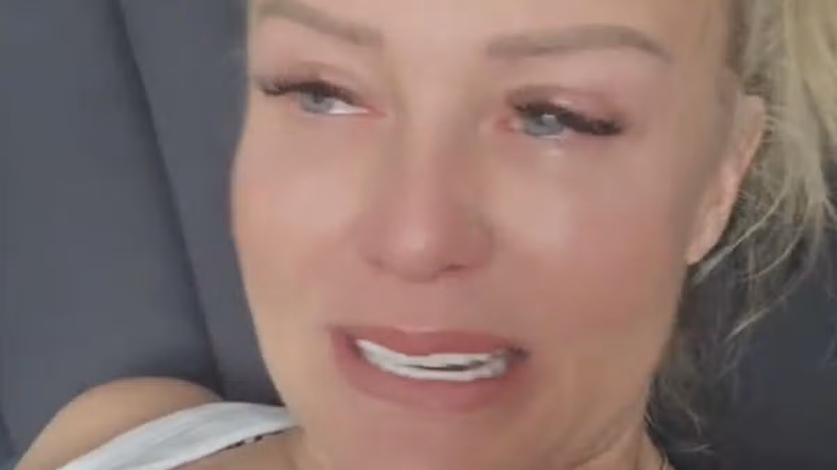 Tearful mum escorted back through UK airport after she's barred from going on £6.5k holiday