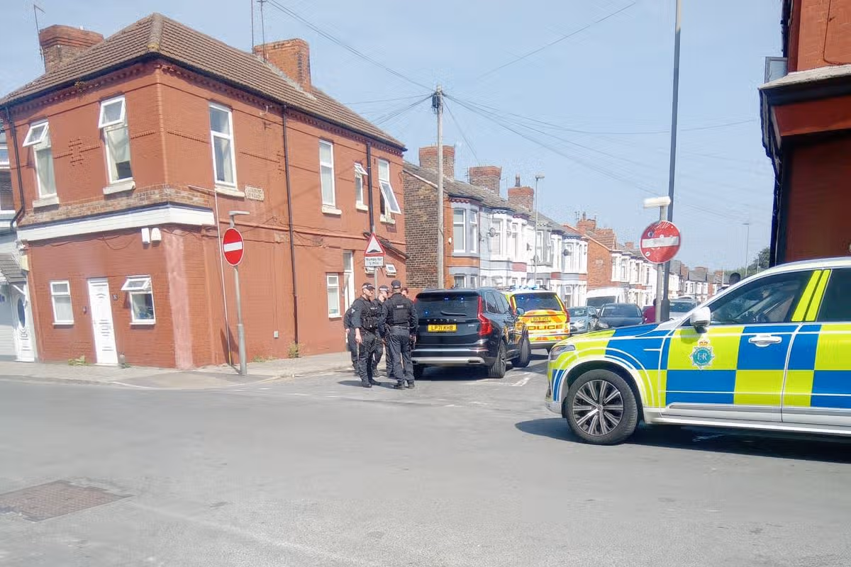 Armed police on City Road in Walton
