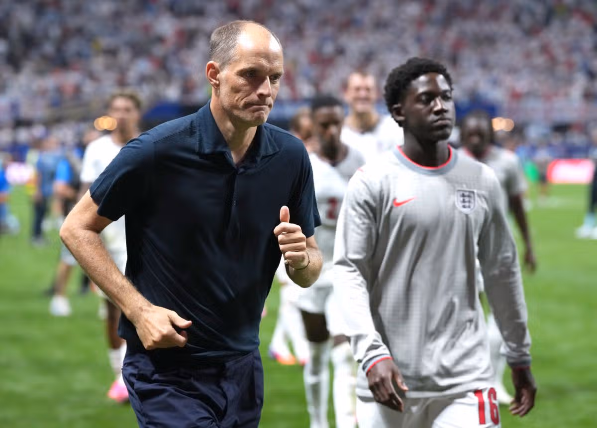 England manager Thomas Tuchel and Kobbie Mainoo following defeat in the FIFA World Cup 2026 semi-final match at the Atlanta Stadium. 
