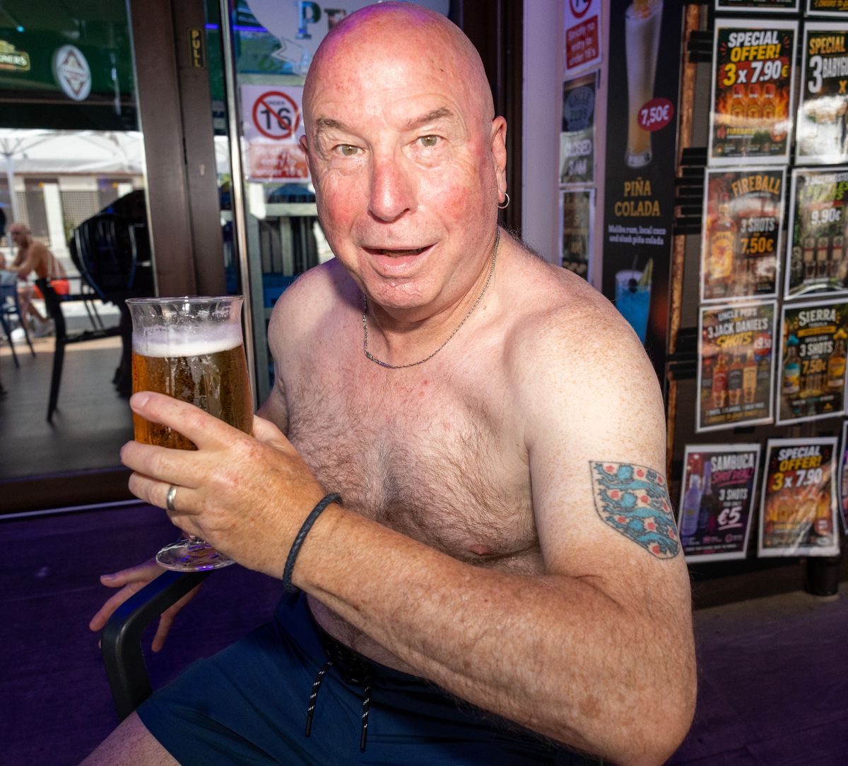 Anthony Rathbone shows off his Three Lions tattoo