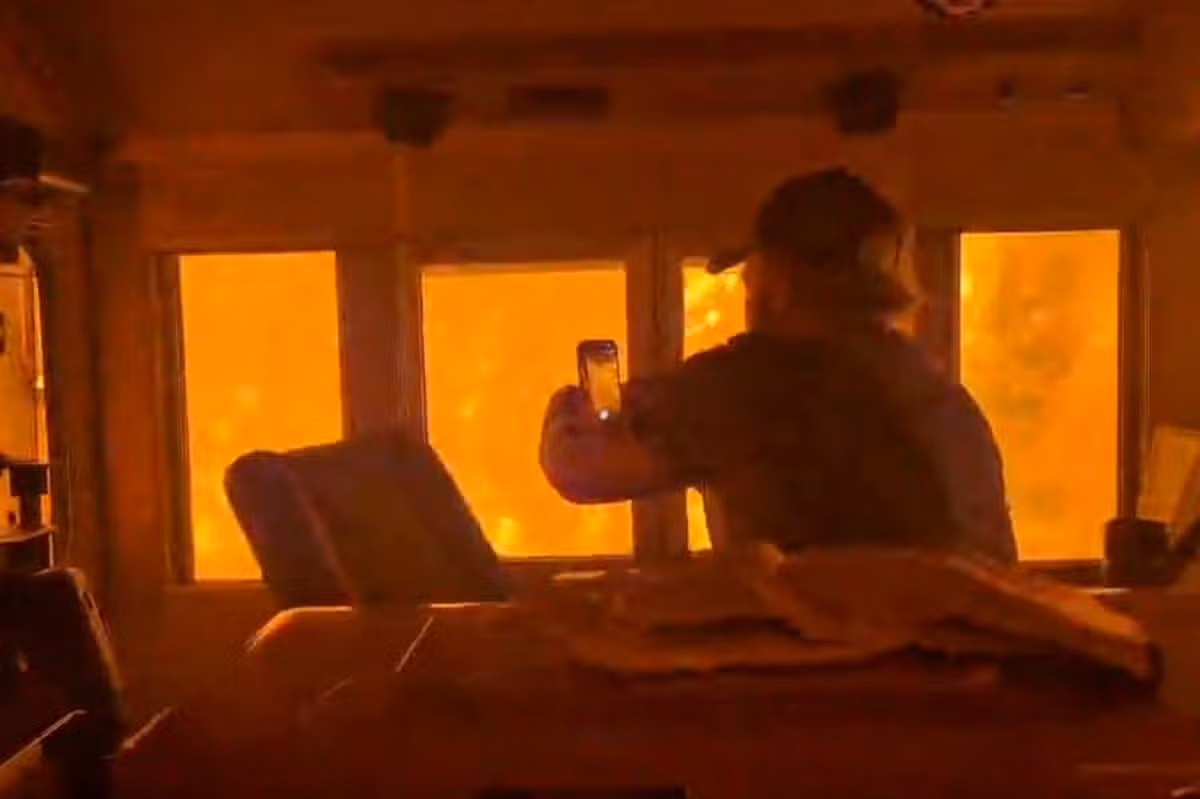 Terrifying video shows train 'encased in flames' with people inside in Canada wildfires