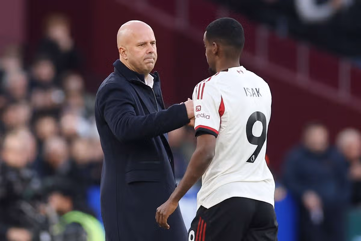Former Liverpool head coach Arne Slot (left) with record signing Alexander Isak
