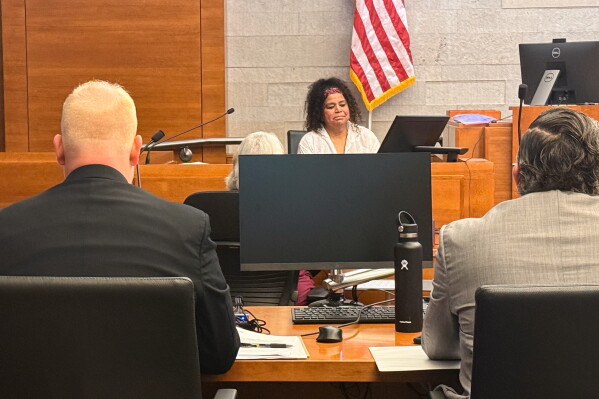 Maria Dearaujo testifies in her own defense at trial Tuesday, May 19, 2026, in Columbus, Ohio. (Jake Zuckerman/Signal Ohio via AP)