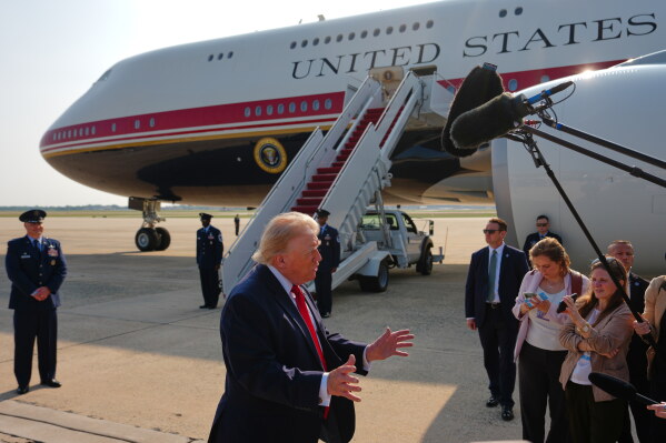 President Donald Trump speaks to reporters before boarding Air Force One, Wednesday, July 1, 2026, at Joint Base Andrews, Md. (AP Photo/Julia Demaree Nikhinson)