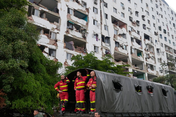 Rscuers from Spain mobilized though the area affected in the earthquakes in La Guaira, Venezuela, Tuesday, June 30, 2026. (AP Photo/Ariana Cubillos)