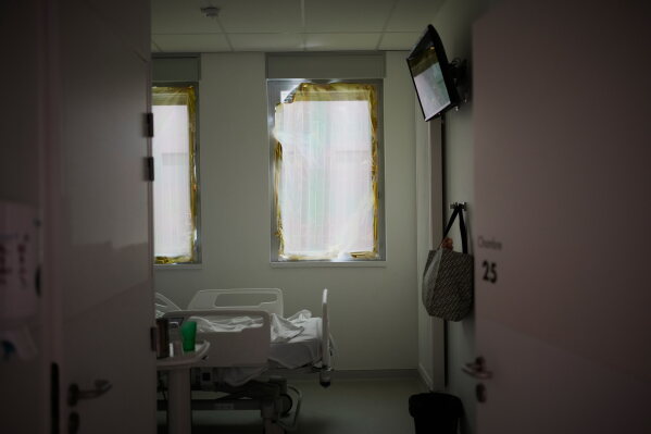A heat-protection is set on a window at the emergency department of the Paris-Saclay Hospital, outside Paris, Tuesday June 30, 2026. (AP Photo/Christophe Ena )