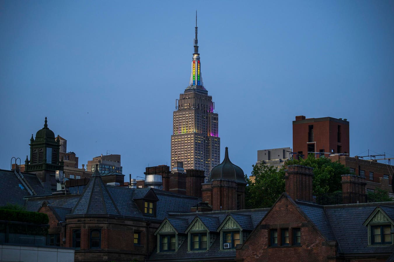 Masked Trespassers Unfurl Banner At Top Of Empire State Building