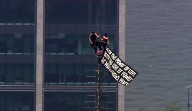 Empire State Building climbers display quote on banner: What does it say?