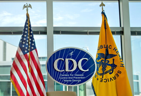 This Nov. 19, 2013 file photo shows a Centers for Disease Control and Prevention logo at the agency's federal headquarters in Atlanta. (AP Photo/David Goldman, File)