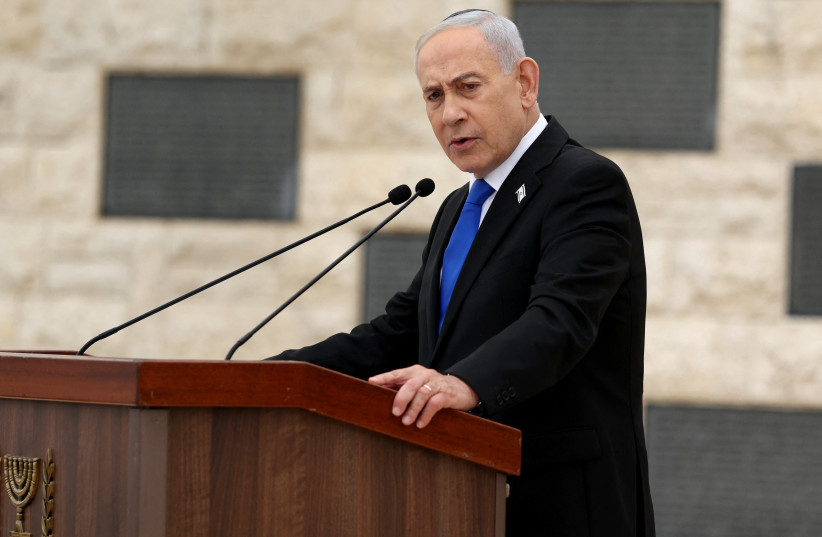 Israel's Prime Minister Benjamin Netanyahu speaks during a ceremony commemorating Israel's Remembrance Day for fallen soldiers, or Yom HaZikaron, at the Military Cemetery on Mount Herzl in Jerusalem on April 21, 2026