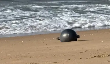 Australian authorities issue warning over mysterious space balls found washed up on beach