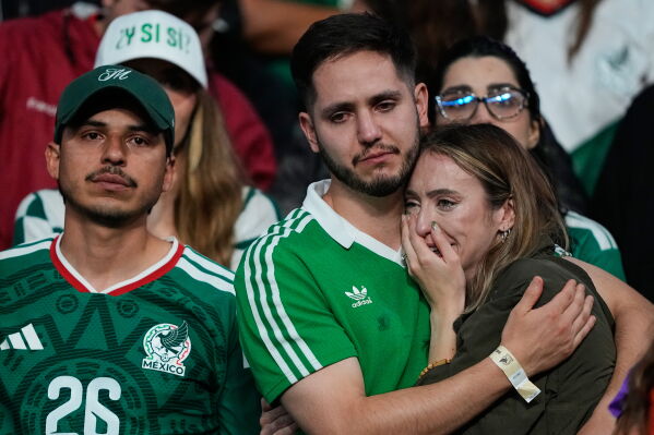 Mexico fans react following the World Cup round of 16 soccer match between Mexico and England in Mexico City, Sunday, July 5, 2026. (AP Photo/Natacha Pisarenko)