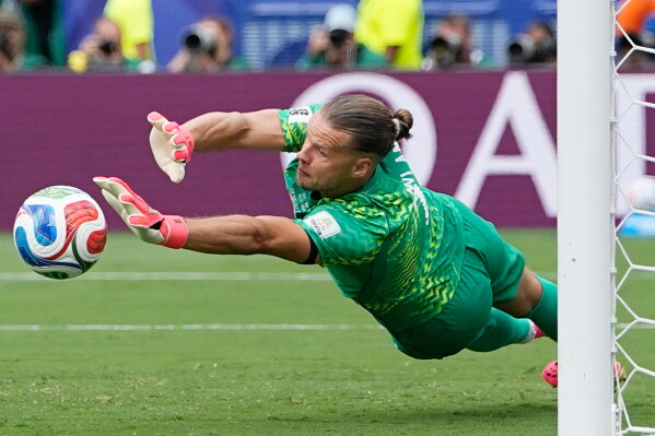 Norway goalkeeper Oerjan Nyland (1) saves a penalty kick during the World Cup round of 16 soccer match between Brazil and Norway in East Rutherford, N.J., near New York, Sunday, July 5, 2026. (AP Photo/Frank Franklin II)