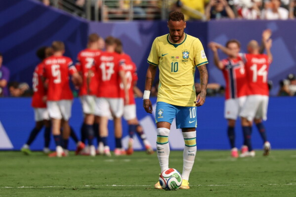 Brazil's Neymar (10) reacts after Norway's Erling Haaland (9) scored the opening goal during the World Cup round of 16 soccer match between Brazil and Norway in East Rutherford, N.J., near New York, Sunday, July 5, 2026. (AP Photo/Adam Hunger)