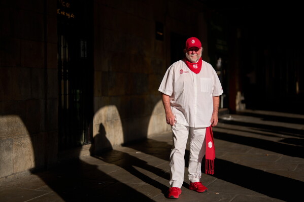 San Fermin tour operator Bruce Anderson poses in Pamplona, northern Spain, Thursday, July 2, 2026. (AP Photo/Miguel Oses)