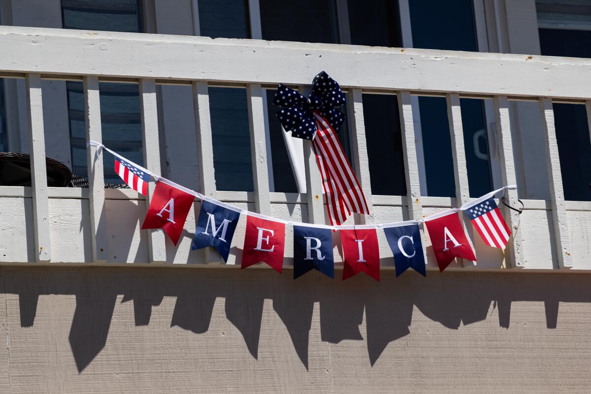 Flags decorate rentals and homes in Newport Beach.