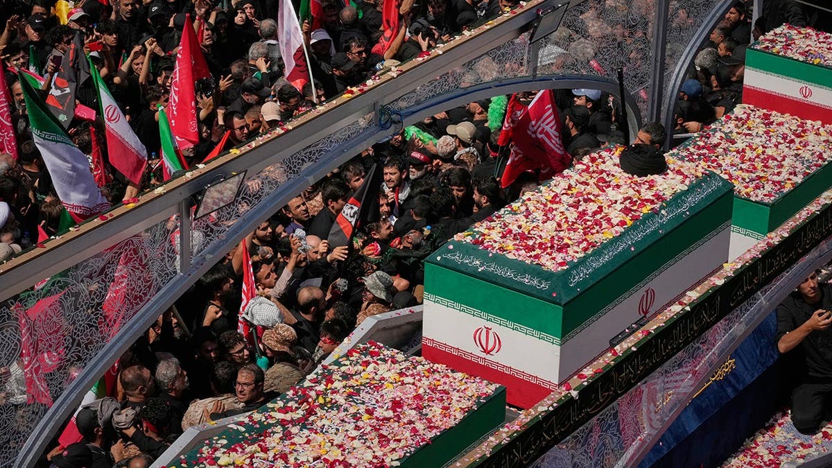 Coffin of Iranian Supreme Leader Ayatollah Ali Khamenei moved through Tehran