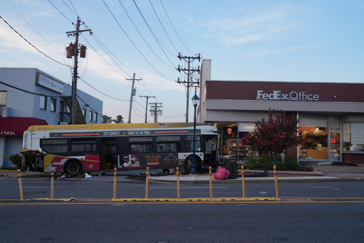 Mass casualty incident declared after bus crashes into Pikesville building, injuring 33 people